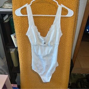 Colsie White Bodysuit with Ruffled V-Neck